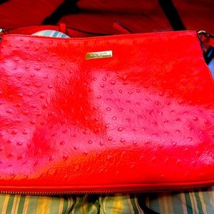 Kate Spade Purse never used. In excellent condition. Adjustable straps